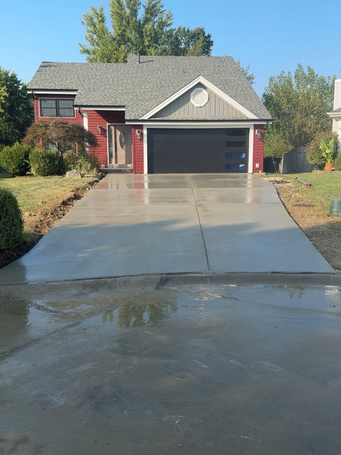 After: Driveway Replacement & Widening by True Form Concrete
